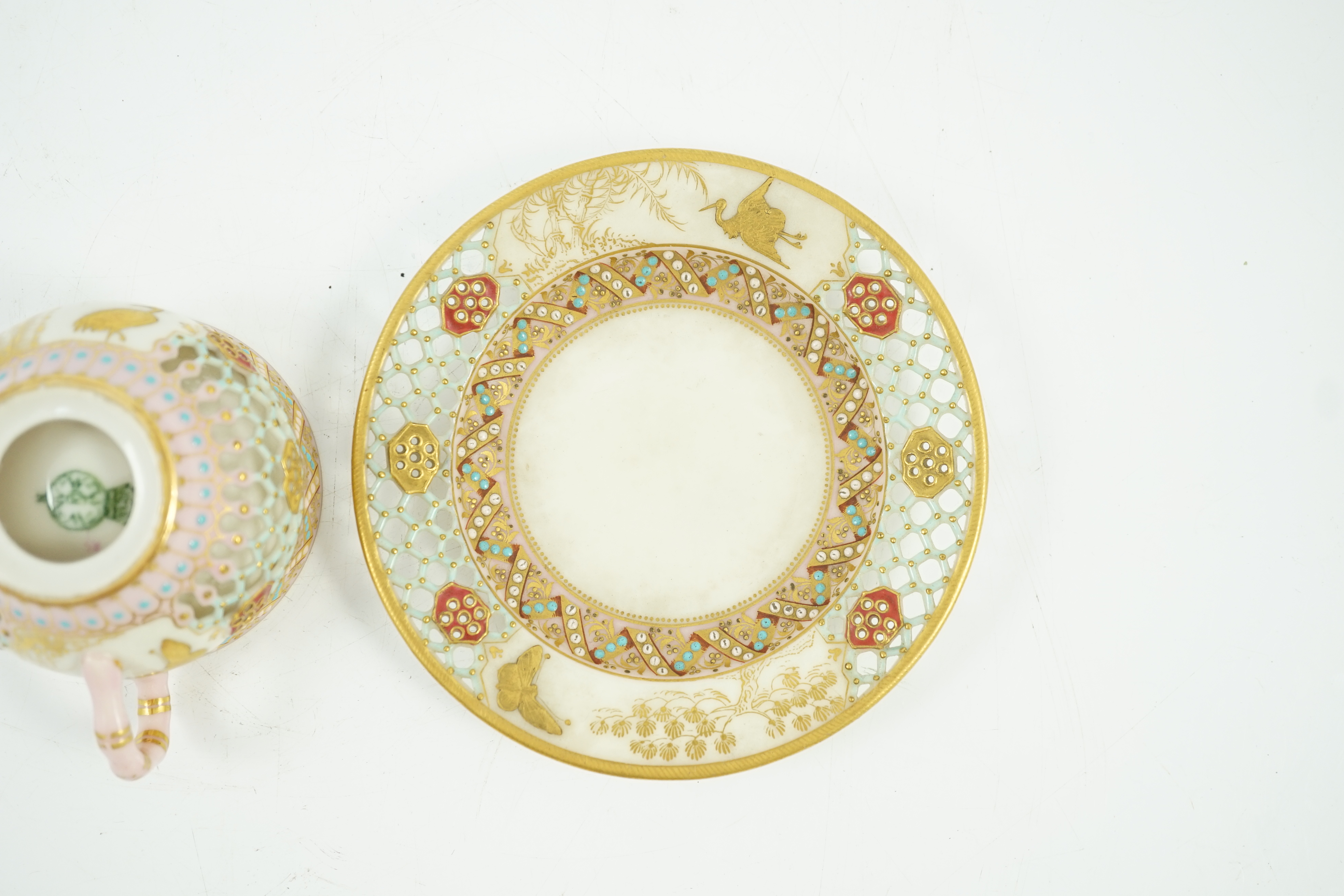 A Royal Worcester reticulated miniature cabinet cup and saucer, late 19th century